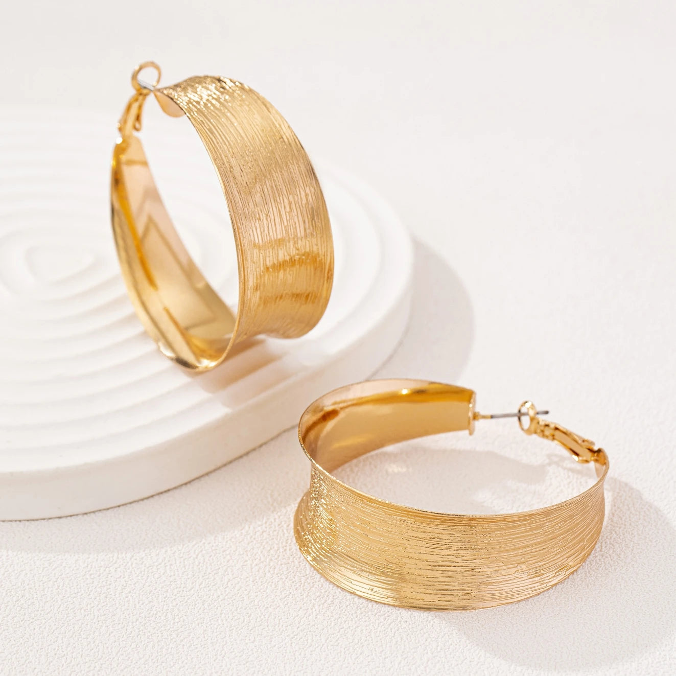 A Pair of Women's Earrings