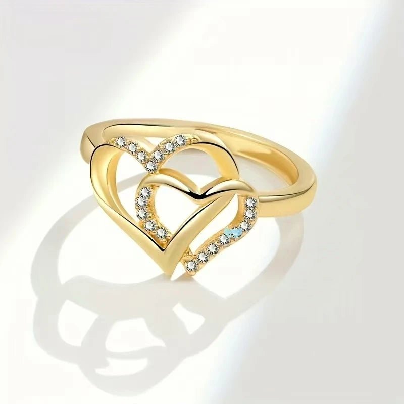 pair of heart-shaped rings for women
