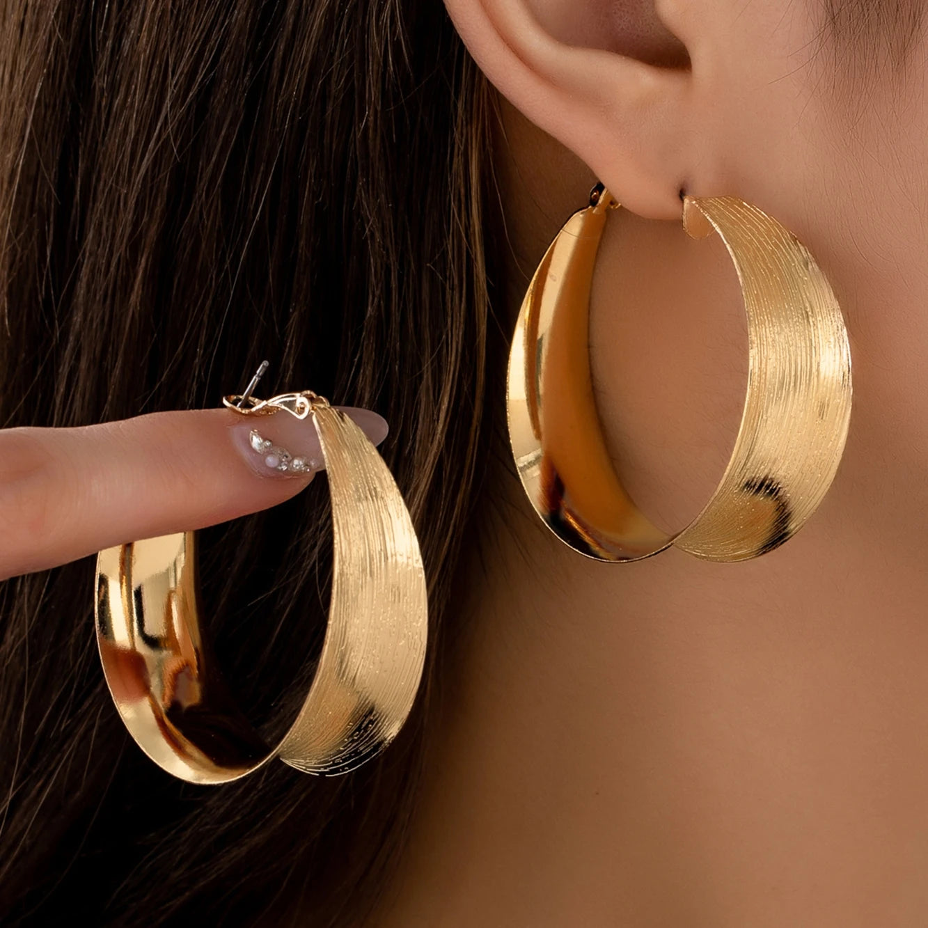 A Pair of Women's Earrings