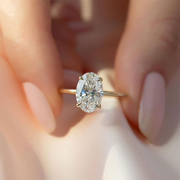 Aurellia Oval Solitaire Hidden Halo Yellow Gold