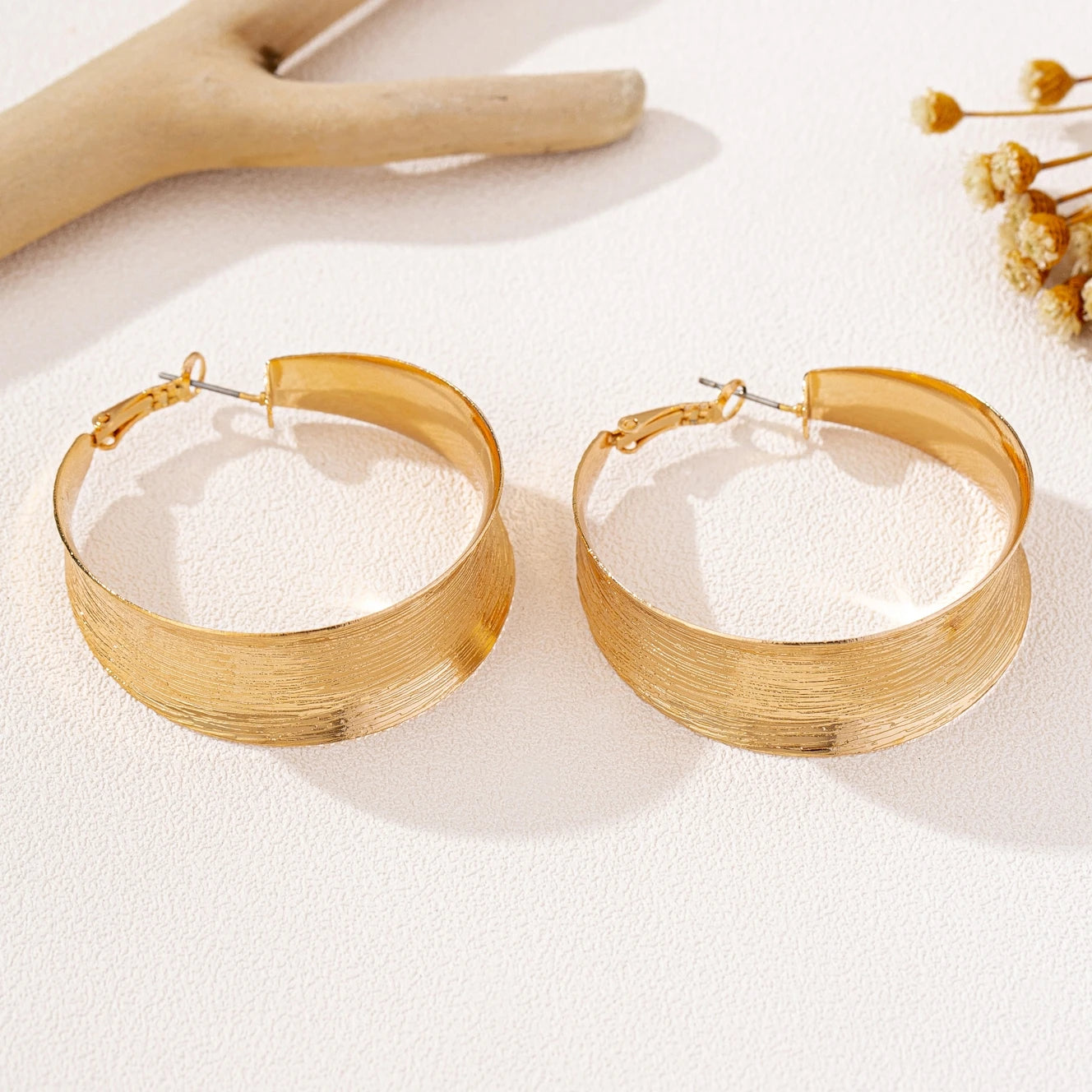 A Pair of Women's Earrings